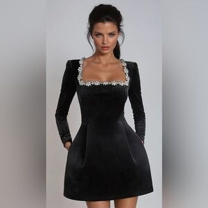 Elegant Black Mini Dress with Floral Embellishments